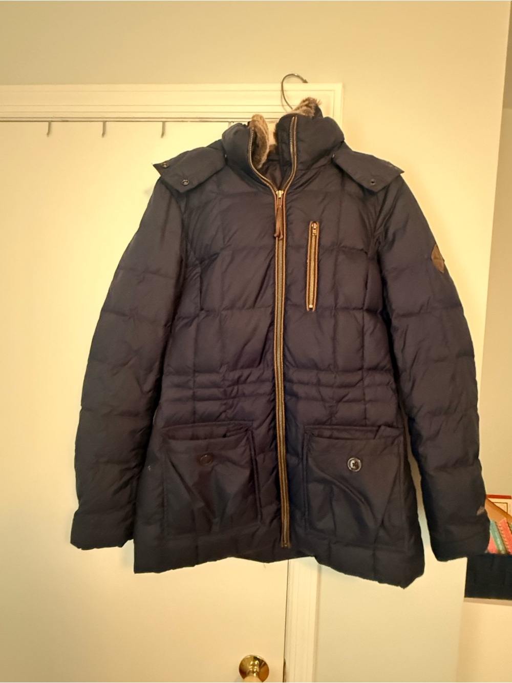 Eddie Bauer down jacket. Navy with brownish fur. Size medium.